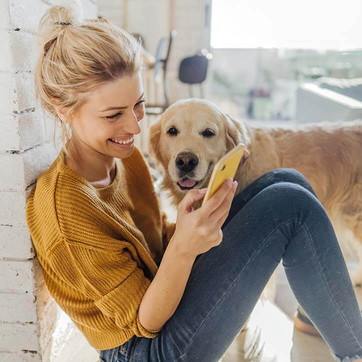 Frau mit Golden Retriever | Doppelherz